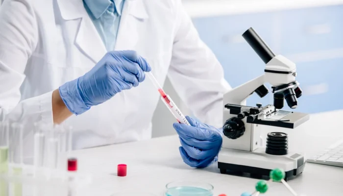 Lab technician preparing a DNA sample for epigenetic analysis